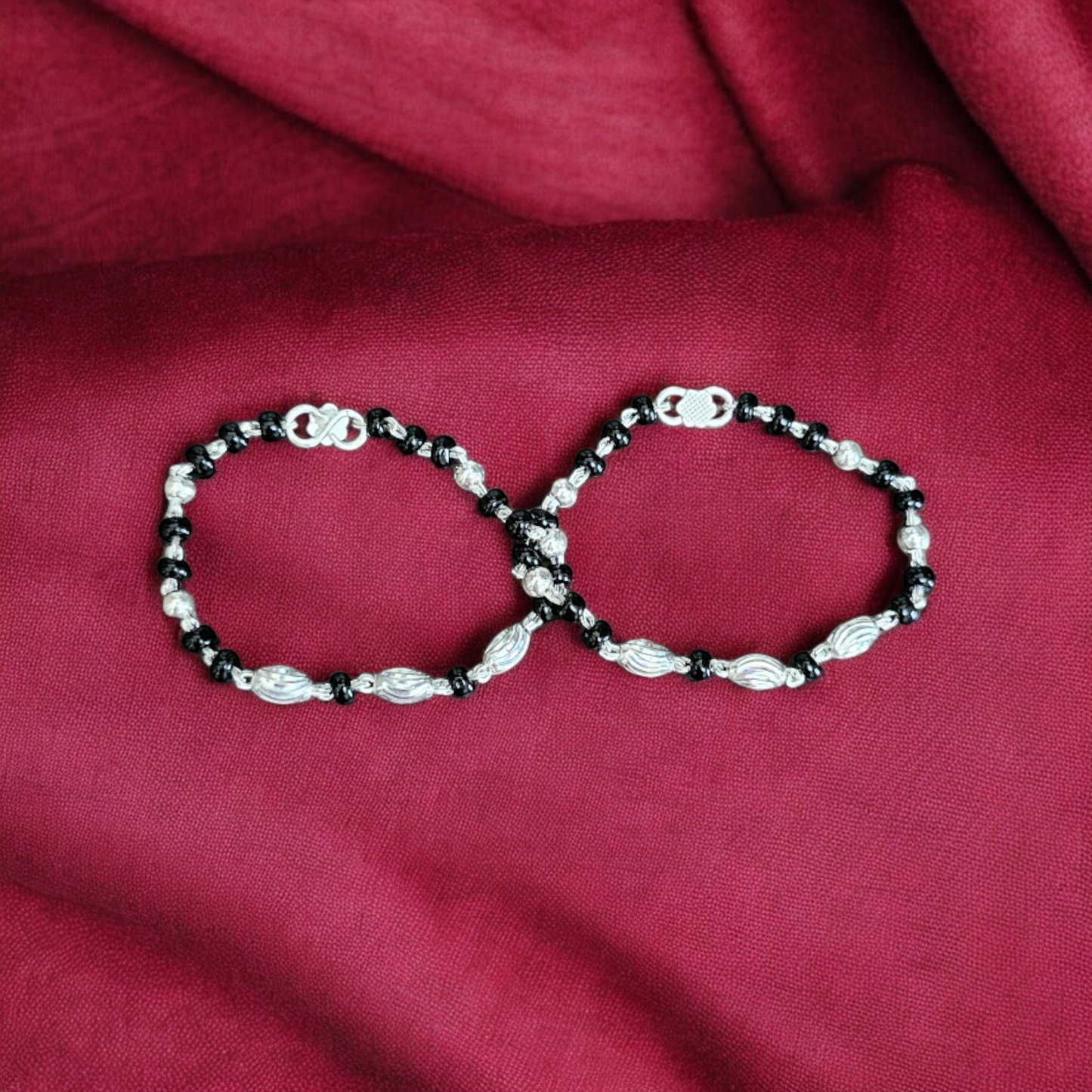 Sterling Silver Kids Nazariya Bracelet With Black And Silver Beads.