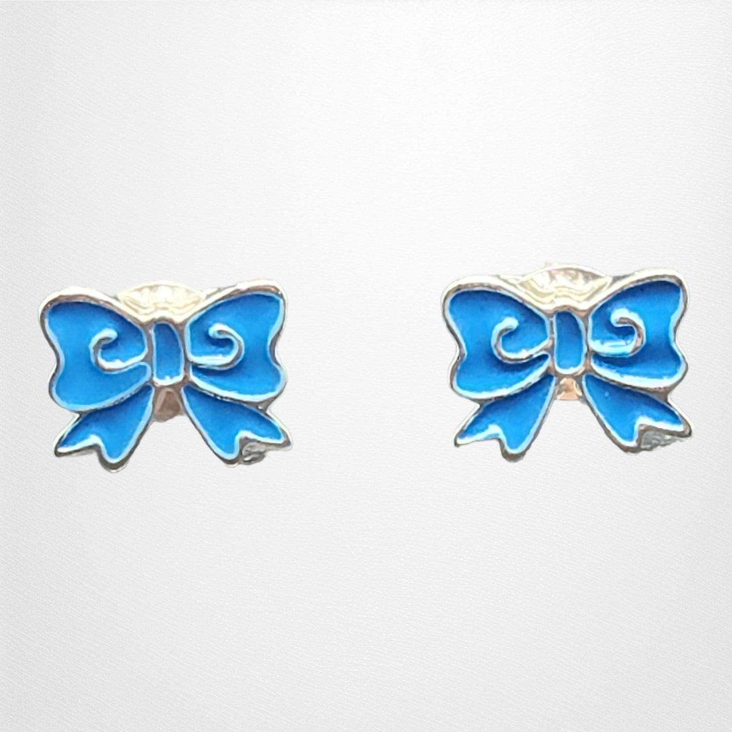 Sterling Silver Bow Shape Kids Earrings.